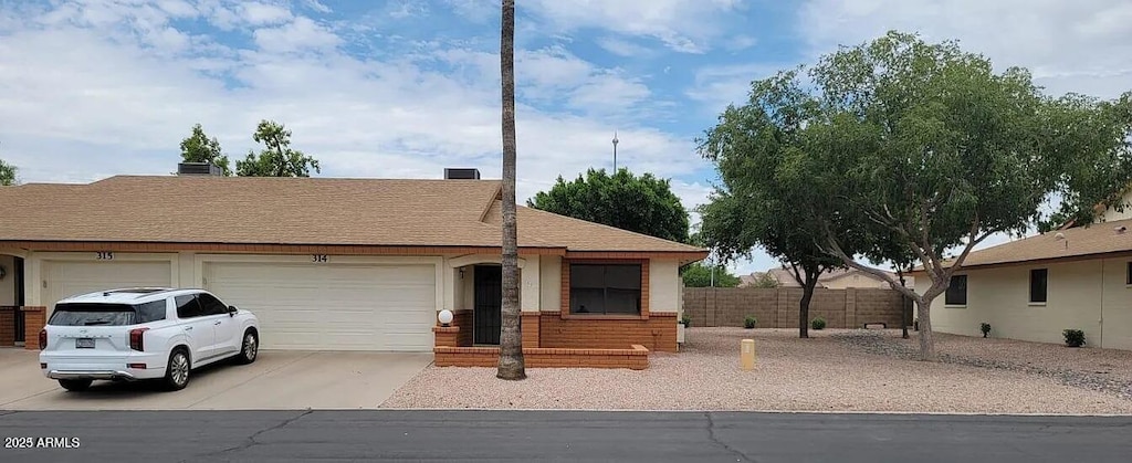 single story home with a garage