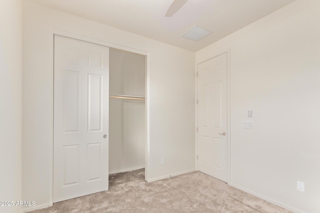 1268 E Jahns Dr, Casa Grande, AZ 85122 - unfurnished bedroom featuring baseboards, light colored carpet, ceiling fan, and a closet