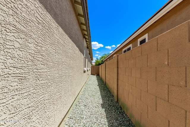 1268 E Jahns Dr, Casa Grande, AZ 85122 - view of home's exterior featuring stucco siding and fence