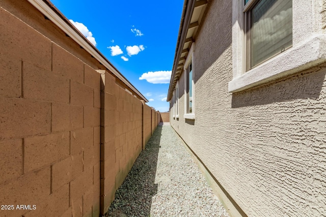 1268 E Jahns Dr, Casa Grande, AZ 85122 - view of side of home featuring fence and stucco siding