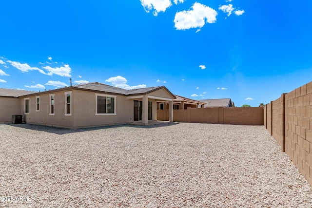 1268 E Jahns Dr, Casa Grande, AZ 85122 - rear view of house with a fenced backyard, a patio area, and stucco siding