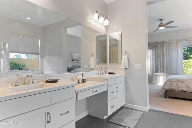 bathroom with ceiling fan, tile patterned floors, and vanity