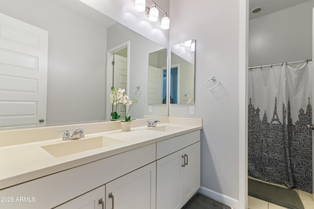 full bath featuring a shower with curtain, a sink, baseboards, and double vanity