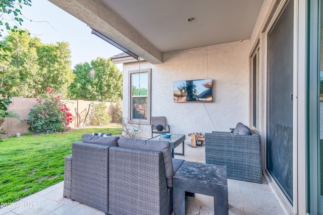 view of patio / terrace with fence and an outdoor hangout area