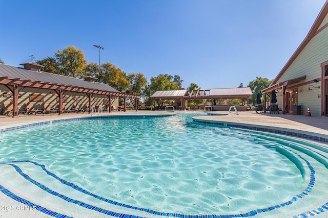 pool featuring a patio area