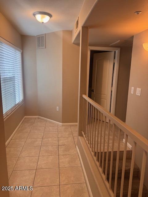 1081 W 1st St Unit 10, Tempe, AZ 85281 - corridor featuring light tile patterned flooring and baseboards