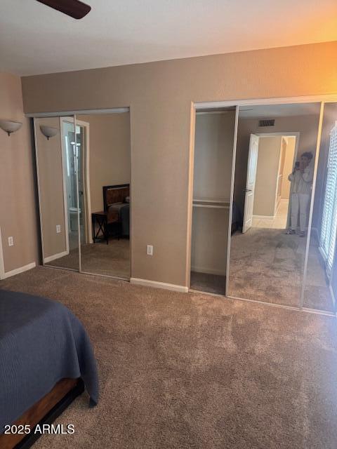 1081 W 1st St Unit 10, Tempe, AZ 85281 - carpeted bedroom with baseboards and ceiling fan