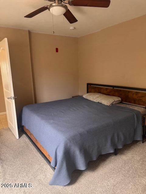 1081 W 1st St Unit 10, Tempe, AZ 85281 - bedroom featuring light carpet and ceiling fan