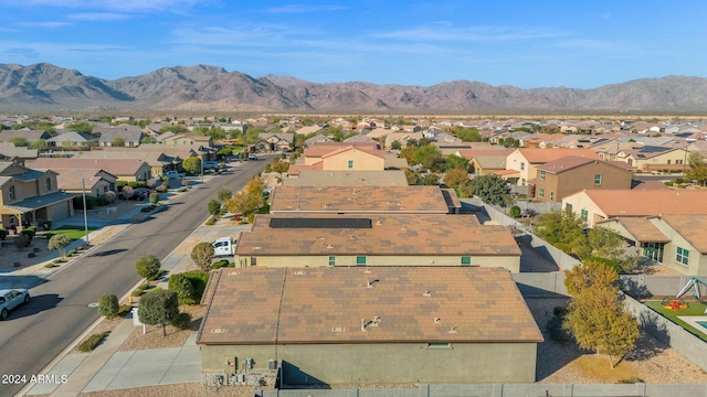 birds eye view of property featuring a mountain view