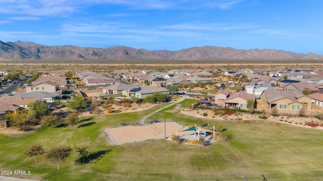 birds eye view of property with a mountain view