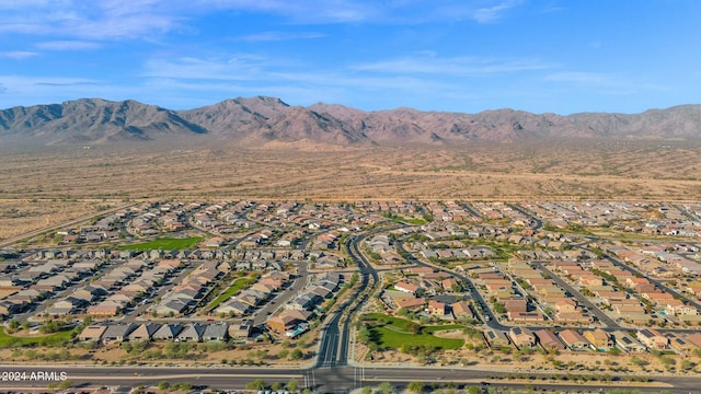 birds eye view of property with a mountain view