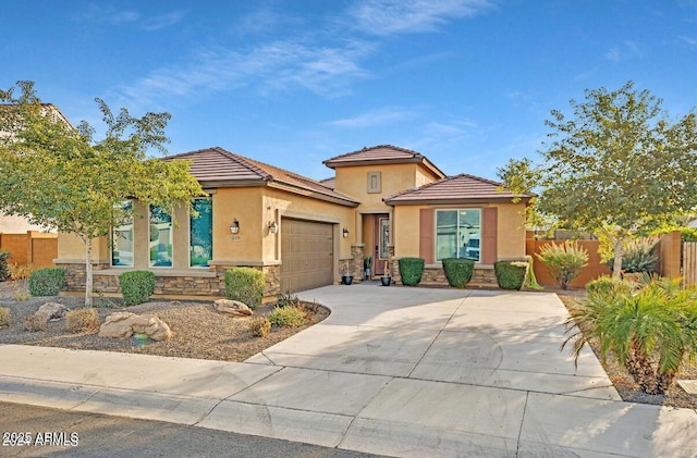 view of front of home with a garage