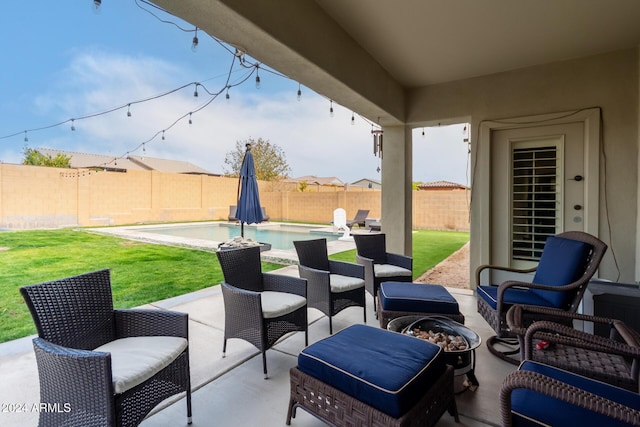 view of patio with a fenced in pool