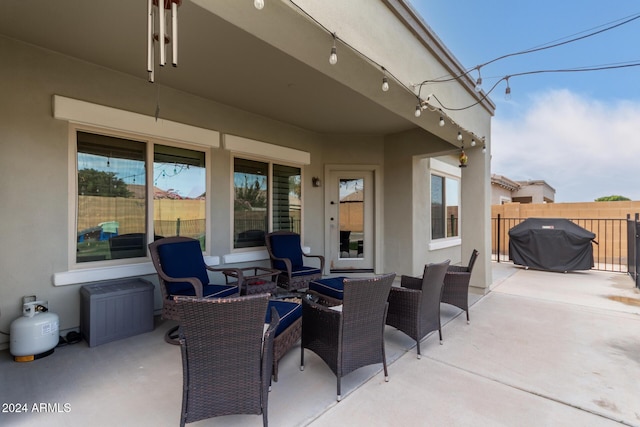 view of patio with a grill