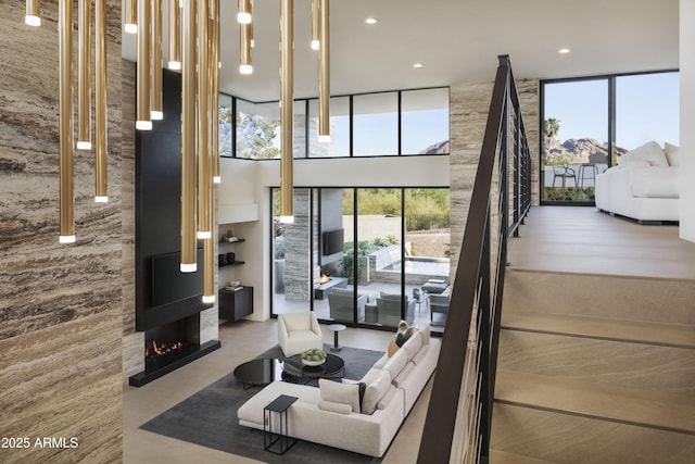 4451 E Joshua Tree Ln, Paradise Valley, AZ 85253 - living area with floor to ceiling windows and recessed lighting