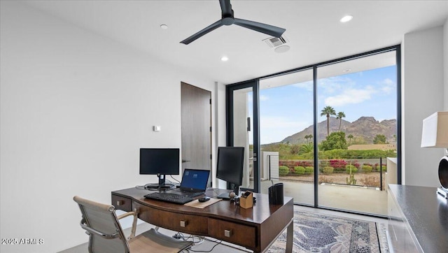 4451 E Joshua Tree Ln, Paradise Valley, AZ 85253 - home office featuring expansive windows, ceiling fan, recessed lighting, and wood finished floors