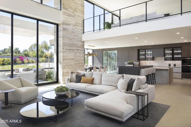 4451 E Joshua Tree Ln, Paradise Valley, AZ 85253 - living room featuring a high ceiling and recessed lighting