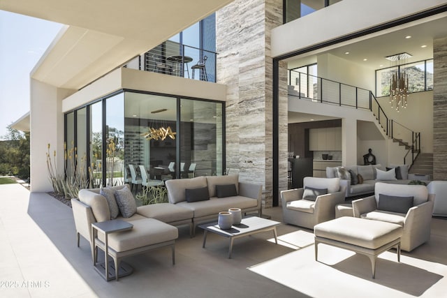 4451 E Joshua Tree Ln, Paradise Valley, AZ 85253 - view of patio featuring stairway and an outdoor living space