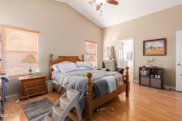 bedroom featuring ceiling fan, high vaulted ceiling, and light wood-type flooring