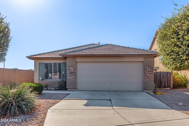 view of front of property with a garage