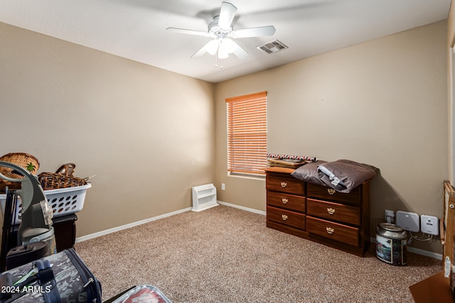 miscellaneous room with light carpet and ceiling fan