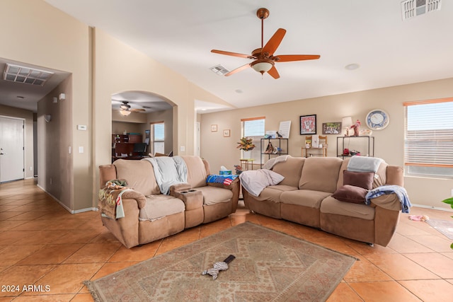 living room featuring ceiling fan and light tile patterned floors