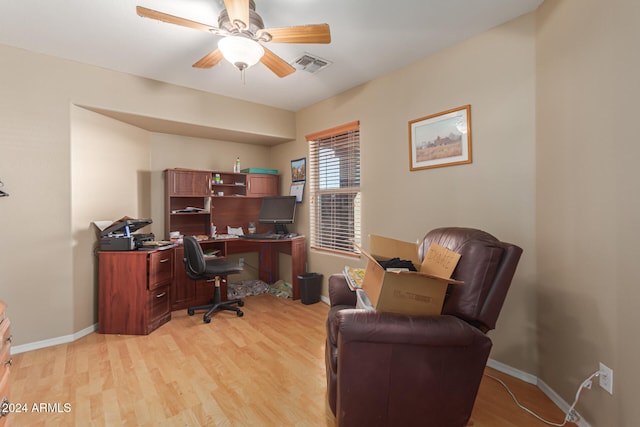 office area with light hardwood / wood-style floors and ceiling fan