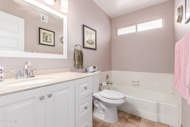 bathroom with a bathing tub, vanity, and toilet