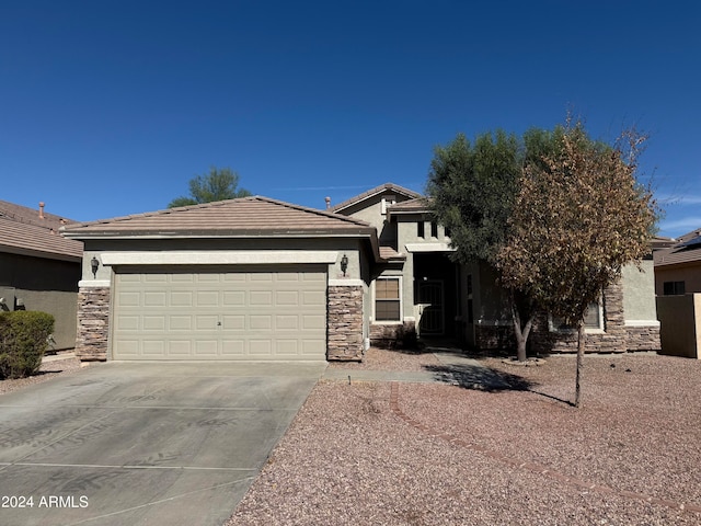 view of front of home featuring a garage