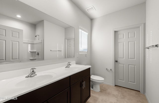 5053 S 252nd Ave, Buckeye, AZ 85326 - full bath featuring toilet, a sink, double vanity, and visible vents