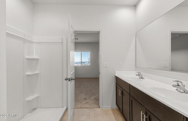 5053 S 252nd Ave, Buckeye, AZ 85326 - full bathroom with double vanity, a shower, tile patterned flooring, and a sink