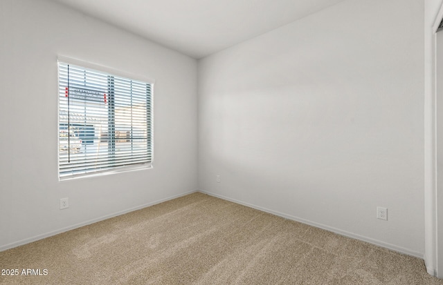 5053 S 252nd Ave, Buckeye, AZ 85326 - empty room featuring carpet floors and baseboards