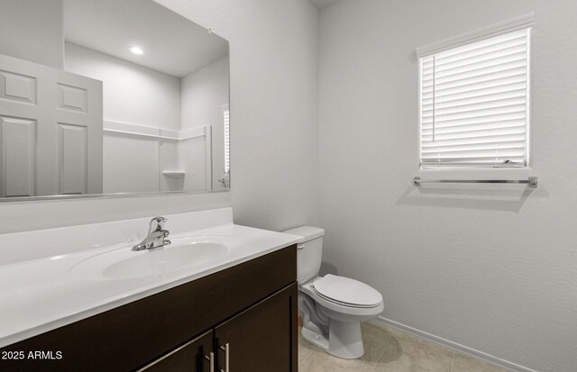 5053 S 252nd Ave, Buckeye, AZ 85326 - bathroom with tile patterned floors, toilet, and vanity