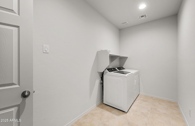 5053 S 252nd Ave, Buckeye, AZ 85326 - washroom featuring baseboards, washing machine and dryer, visible vents, and laundry area