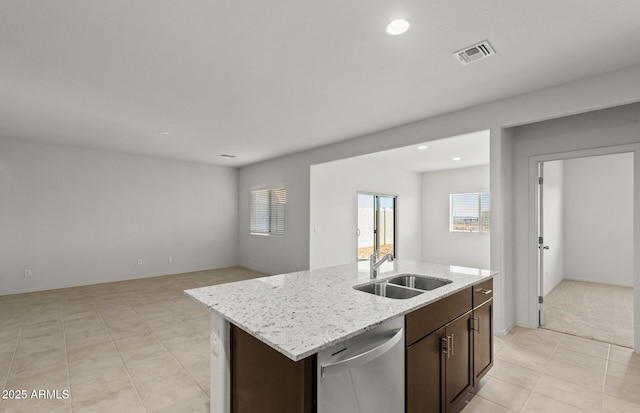 5053 S 252nd Ave, Buckeye, AZ 85326 - kitchen with visible vents, dishwasher, dark brown cabinetry, a sink, and an island with sink
