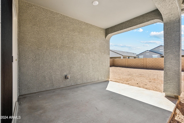 view of patio with fence