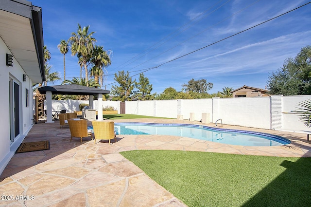 6325 N 83rd Pl, Scottsdale, AZ 85250 - view of pool featuring a yard, a patio, a fenced in pool, and a fenced backyard
