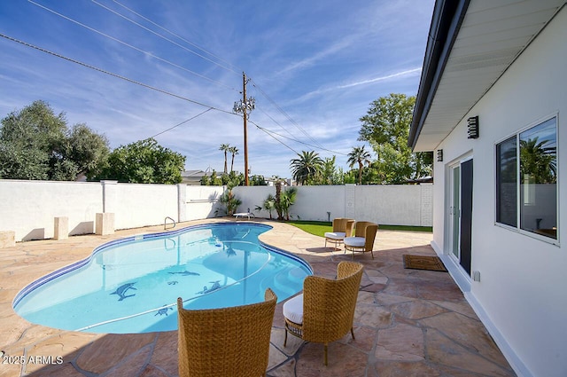 6325 N 83rd Pl, Scottsdale, AZ 85250 - view of swimming pool featuring a patio, a fenced in pool, and a fenced backyard