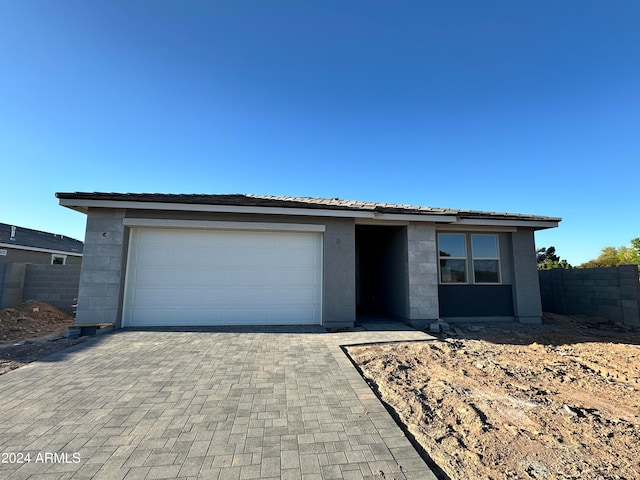 view of front of home with a garage