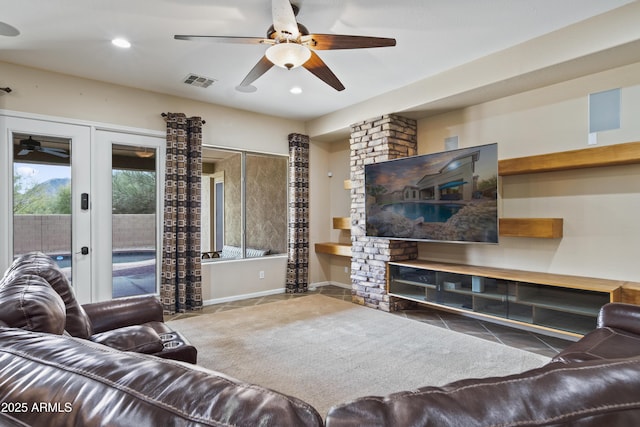 living room featuring french doors, ceiling fan, and tile patterned flooring