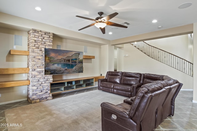 living room with ceiling fan and carpet flooring