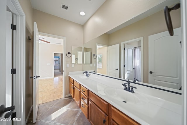 bathroom featuring vanity and tile patterned flooring