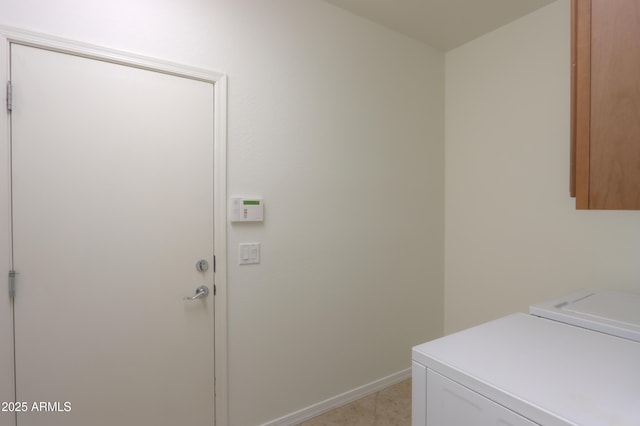 laundry area with laundry area and baseboards