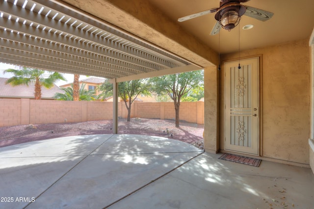 view of patio / terrace featuring a fenced backyard and a ceiling fan