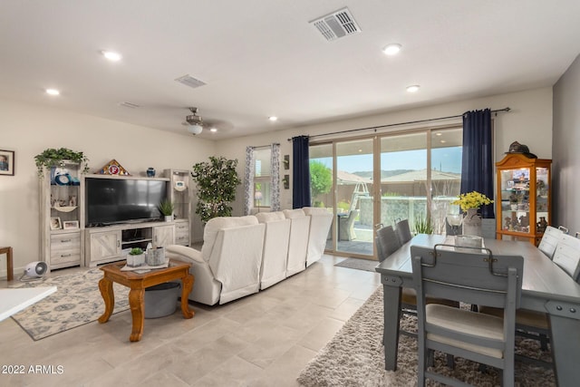 living room with ceiling fan