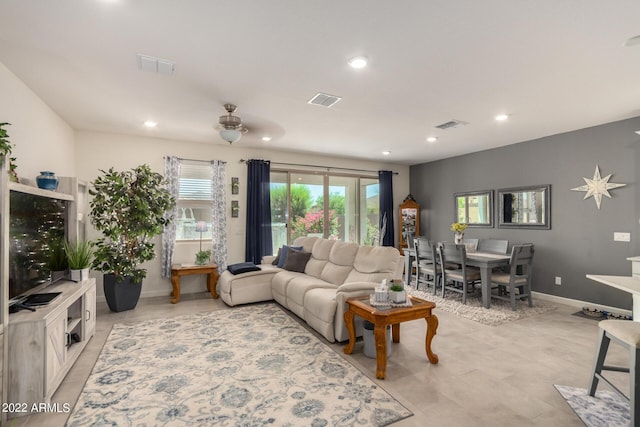 living room featuring ceiling fan