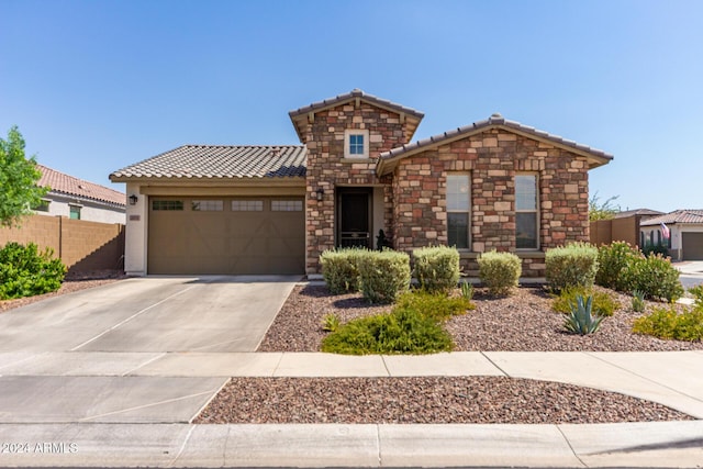 view of front of home with a garage