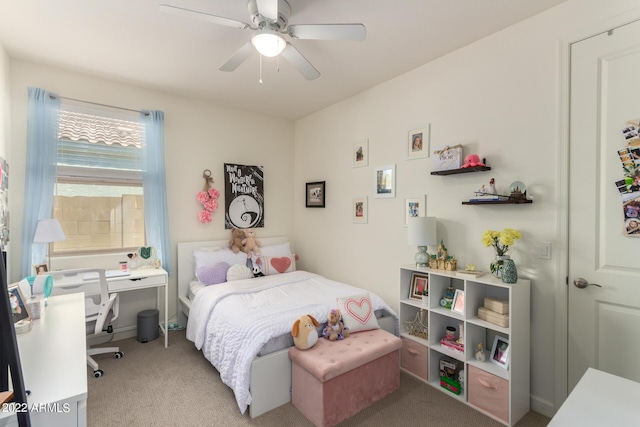 bedroom featuring light carpet and ceiling fan