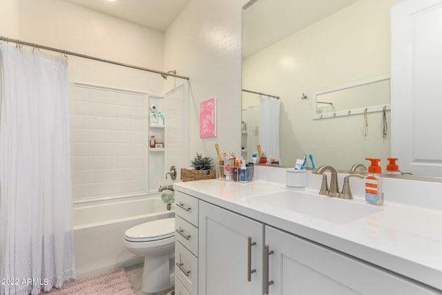 full bathroom with vanity, toilet, and shower / bath combo with shower curtain