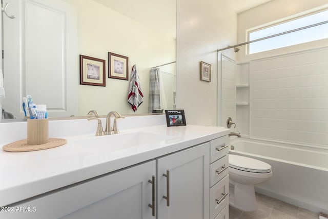 full bathroom with vanity, toilet, and shower / tub combo